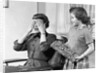 1950s Woman Mother Hands Covering Eyes As Girl Daughter Gives Her A Gift Present by Anonymous