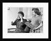 1950s Woman Mother Hands Covering Eyes As Girl Daughter Gives Her A Gift Present by Anonymous