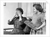 1950s Woman Mother Hands Covering Eyes As Girl Daughter Gives Her A Gift Present by Anonymous