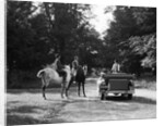 1920s 1930s Couple On Horses Meeting Woman On Road In Convertible Touring Car by Anonymous