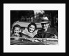 1930s Family Portrait Man Father Woman Mother Boy Son Riding In Convertible Automobile by Anonymous