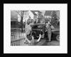 1950s Mother And Daughter Waving To Father Opening Automobile Door In Front Of Suburban Home by Anonymous
