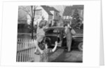 1950s Mother And Daughter Waving To Father Opening Automobile Door In Front Of Suburban Home by Anonymous