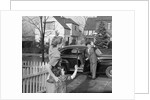 1950s Mother And Daughter Waving To Father Opening Automobile Door In Front Of Suburban Home by Anonymous