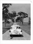 1950s Back Of White Ford Sedan Driving Off With Just Married Sign by Anonymous