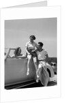 1930s Friends Sitting With Convertible Roadster Automobile Talking Together At Seashore by Anonymous