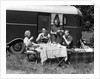 1930s Two Couples Eating Picnic Lunch Beside Camping Trailer by Anonymous