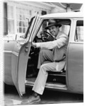1950s Man Holding Car Door Open by Anonymous