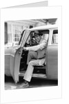 1950s Man Holding Car Door Open by Anonymous