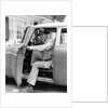 1950s Man Holding Car Door Open by Anonymous