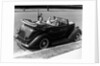 1940s Family Of Four In Convertible Ford V-8 Sedan At Camera by Anonymous