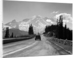 1930s Sedan Automobile Driving High Mountain Road Towards Snow Capped Mount Rainier Washington State Usa by Anonymous