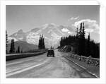 1930s Sedan Automobile Driving High Mountain Road Towards Snow Capped Mount Rainier Washington State Usa by Anonymous
