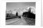 1930s Sedan Automobile Driving High Mountain Road Towards Snow Capped Mount Rainier Washington State Usa by Anonymous