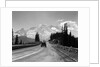 1930s Sedan Automobile Driving High Mountain Road Towards Snow Capped Mount Rainier Washington State Usa by Anonymous