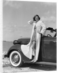 1930s 1940s Woman Wearing Chenille Beach Robe Posing On Running Board Of Convertible Roadster Automobile by Anonymous