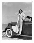 1930s 1940s Woman Wearing Chenille Beach Robe Posing On Running Board Of Convertible Roadster Automobile by Anonymous