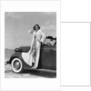1930s 1940s Woman Wearing Chenille Beach Robe Posing On Running Board Of Convertible Roadster Automobile by Anonymous