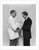 1930s 1940s Man Doctor Showing New Born Infant Baby To Proud Father by Anonymous