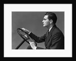 1930s 1940s Man Wearing Suit And Tie Holding Automobile Steering Wheel by Anonymous
