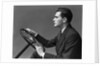 1930s 1940s Man Wearing Suit And Tie Holding Automobile Steering Wheel by Anonymous