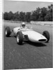 1960s Lotus Ford Race Car Speeding Around Track by Anonymous