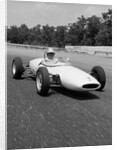1960s Lotus Ford Race Car Speeding Around Track by Anonymous