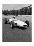 1960s Lotus Ford Race Car Speeding Around Track by Anonymous