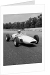 1960s Lotus Ford Race Car Speeding Around Track by Anonymous