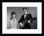 1960s Teenage Entertainment Duo Man Playing Guitar And Woman Singing Holding Microphone by Anonymous