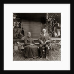 1890s 1900s Portrait Senior Couple Seated In Garden Man Holding Ear Trumpet by Anonymous