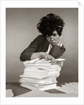 1960s 1970s Secretary with Pencil Stuck In Teased Hair Overworked Expression by Corbis