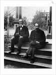 1890s 1900 Two Bearded Men In Suits Holding Bowler Hats Sitting On Stairs In Front Of House by Anonymous