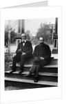1890s 1900 Two Bearded Men In Suits Holding Bowler Hats Sitting On Stairs In Front Of House by Anonymous