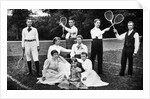 1890s 1900 Men Holding Racquets and Women and One Child In Front Of Net On Grass Tennis Court by Anonymous