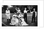 1890s 1900 Men Holding Racquets and Women and One Child In Front Of Net On Grass Tennis Court by Anonymous