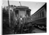 1900s Conductors Posing In Front Of Trolley Car by Anonymous