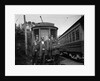 1900s Conductors Posing In Front Of Trolley Car by Anonymous