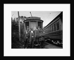 1900s Conductors Posing In Front Of Trolley Car by Anonymous