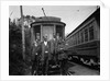 1900s Conductors Posing In Front Of Trolley Car by Anonymous