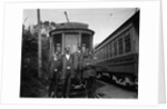 1900s Conductors Posing In Front Of Trolley Car by Anonymous