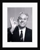 1950s Portrait Of Happy Man Businessman Slesman Making An Ok Hand Sign by Anonymous