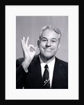 1950s Portrait Of Happy Man Businessman Slesman Making An Ok Hand Sign by Anonymous