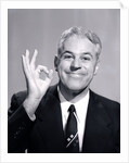 1950s Portrait Of Happy Man Businessman Slesman Making An Ok Hand Sign by Anonymous