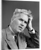 1930s 1940s Man Portrait Hand Held Up To Head by Anonymous