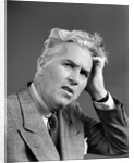 1930s 1940s Man Portrait Hand Held Up To Head by Anonymous