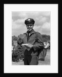 1950s Man Postman Holding Out Letter by Anonymous