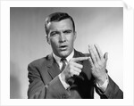 1950s Earnest Salesman Talking Gesturing With Hands by Anonymous