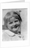 1930s Young Girl Outdoor Portrait With Freckles And Bow In Hair At Camera by Anonymous