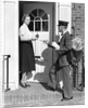 1930s Postman Giving A Letter To A Woman In The Doorway Of A Colonial Brick Home by Anonymous